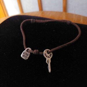 Silver Uno de 50 Adjustable Cord Bracelet with Lock AND Key Charms